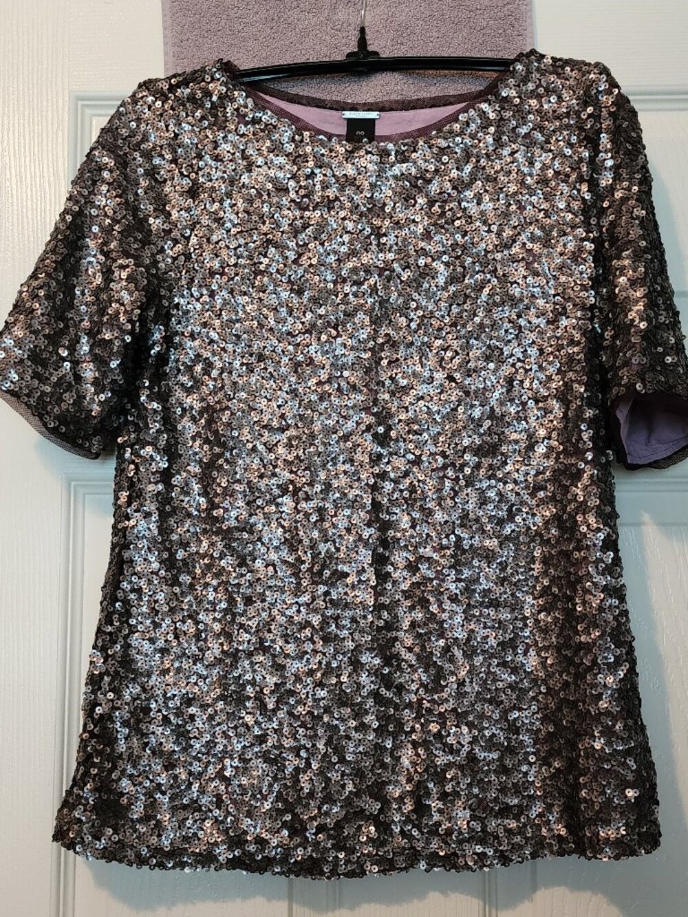Sequin top with purple lining